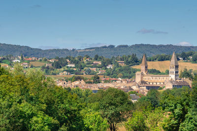 High angle view of trees and buildings against sky