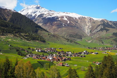 Scenic view of landscape and mountains against sky