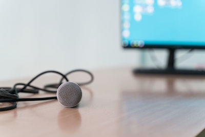 Close-up of mobile phone on table