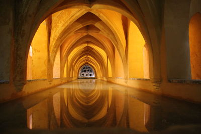 Diminishing perspective of empty archway in old building