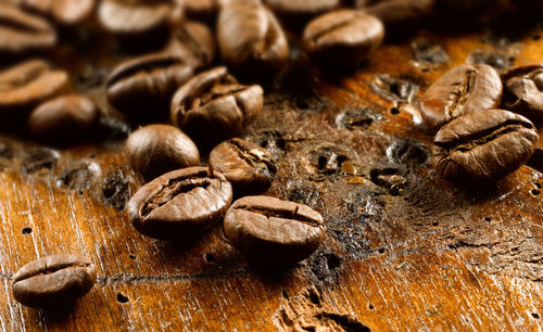 Detail shot of coffee beans on table