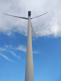 Low angle view of wind turbine against sky