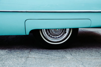 Vintage car parked on road