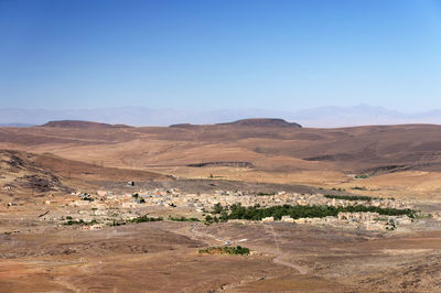 Scenic view of desert against clear sky