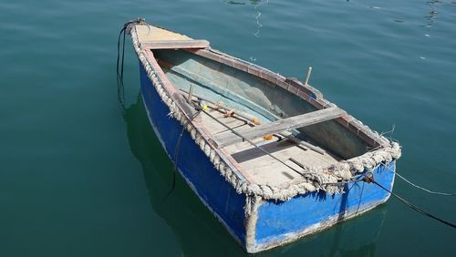 High angle view of fishing boat moored in sea