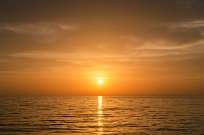 Scenic view of sea at sunset