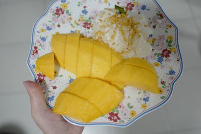 High angle view of person holding ice cream