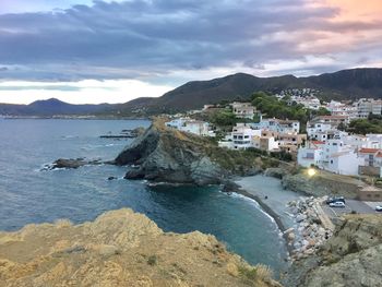 Scenic view of sea against cloudy sky