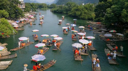 High angle view of people on boat in river