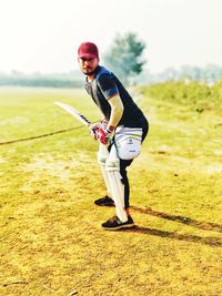 Full length of man playing on field