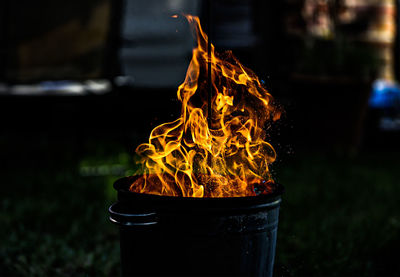 Close-up of fire against black background