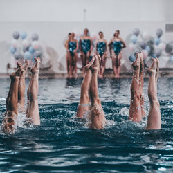 Group of people in swimming pool