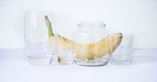 Close-up of drink in glass jar on table