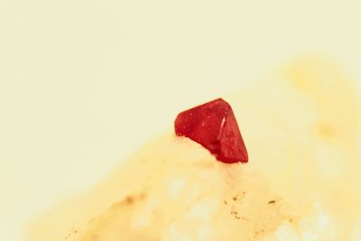 Close-up of strawberry cake against white background