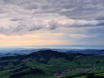 Scenic view of landscape against sky during sunset