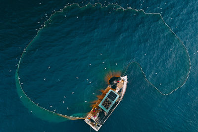 High angle view of sailboat in sea