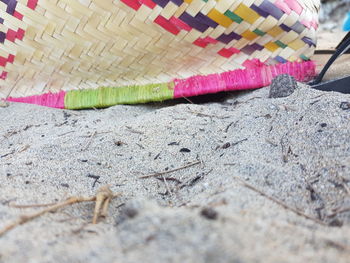 High angle view of multi colored wicker basket on land