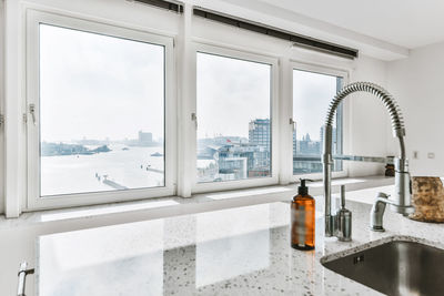 Buildings seen through glass window