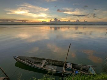 Scenic view of lake against sky during sunset