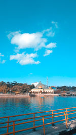 Scenic view of sea against blue sky