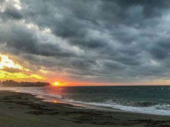 Scenic view of sea against sky during sunset