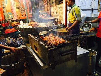 High angle view of food on barbecue grill