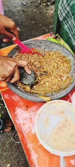 High angle view of man preparing food