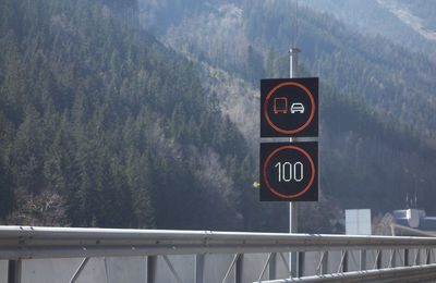 100 kilometers per hour speed limit traffic sign on the road