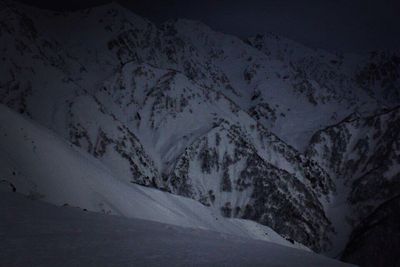 Scenic view of snow covered mountains