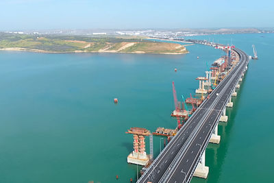 High angle view of pier over sea against sky