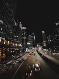 Panoramic view of illuminated city against sky at night