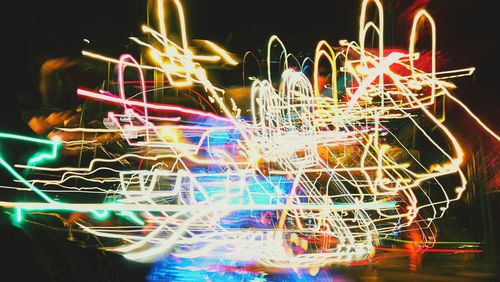 Close-up of illuminated ferris wheel