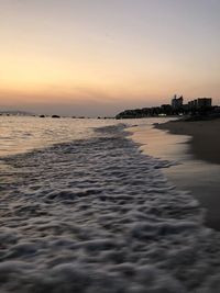 Scenic view of sea against sky during sunset