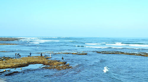 Scenic view of sea against clear sky
