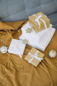 High angle view of paper in box on table