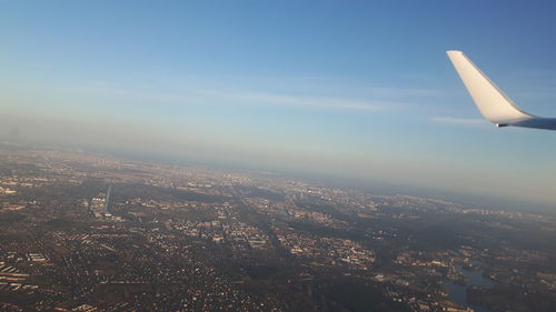 Aerial view of cityscape against sky