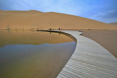 1045 reflections on lake badain east- badain jaran section of the gobi desert. inner mongolia-china.