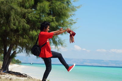 Full length of senior woman on beach