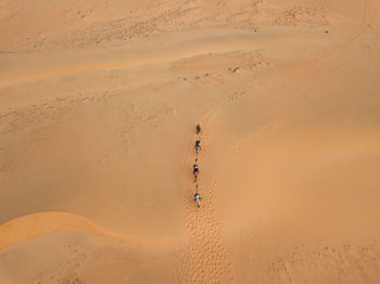 High angle view of sand dunes at beach