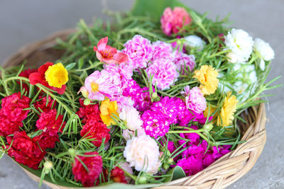 High angle view of various flowers in basket