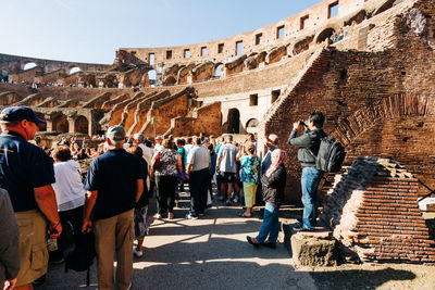 Group of people in front of historical building