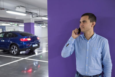 Young man using mobile phone