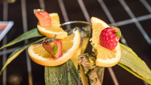 Close-up of fresh cocktail drink on bar counter