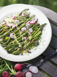 Green asparaguses on plate