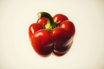 Close-up of bell peppers against white background