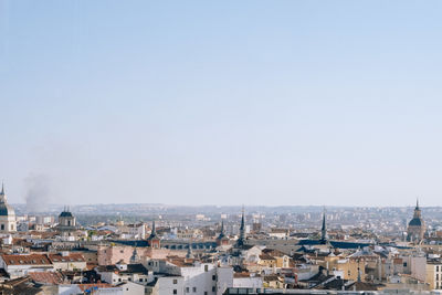 Cityscape against clear sky