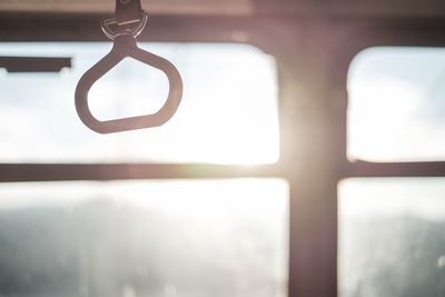 Close-up of window against sky
