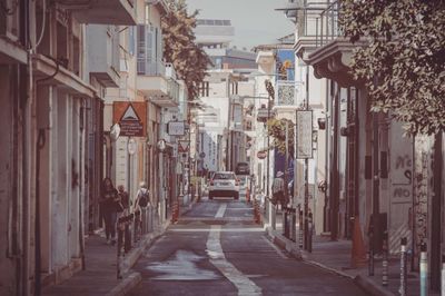 Narrow alley along buildings