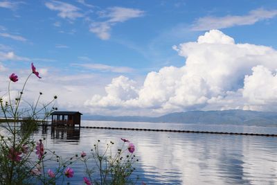 Scenic view of bay against sky