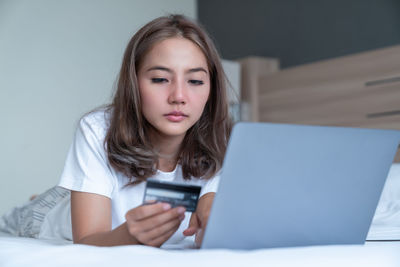 Portrait of teenage girl looking at camera